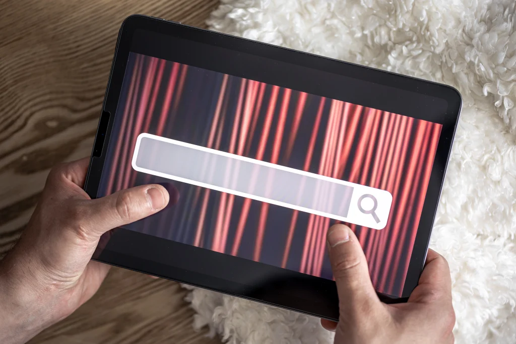 digital-tablet-with-internet-browser-search-bar-screen-male-hands