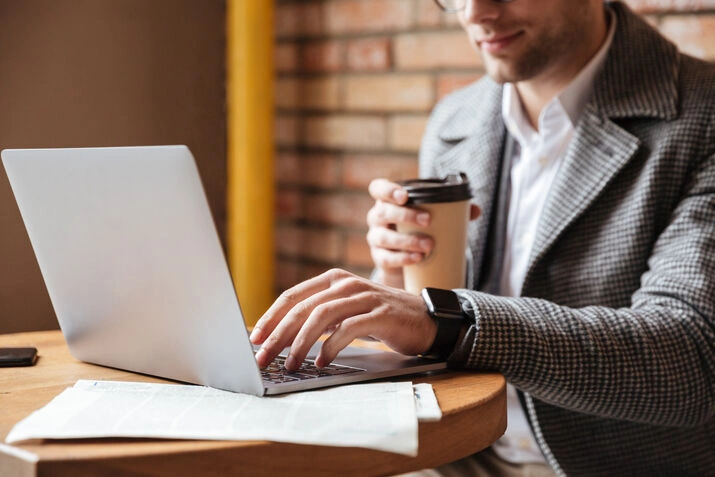 Professional writer working on laptop