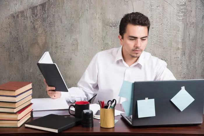 Young businessman at office desk
