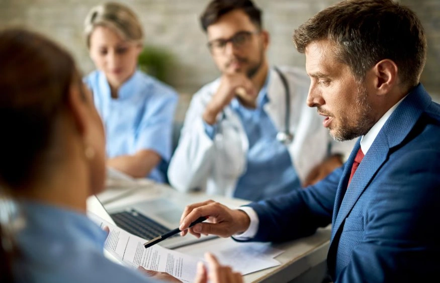 Professionals discussing online reputation management strategies together